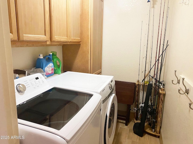 4805 E Kachina Trl Unit 25, Phoenix, AZ 85044 - laundry room with washing machine and dryer, cabinet space, and wood finished floors