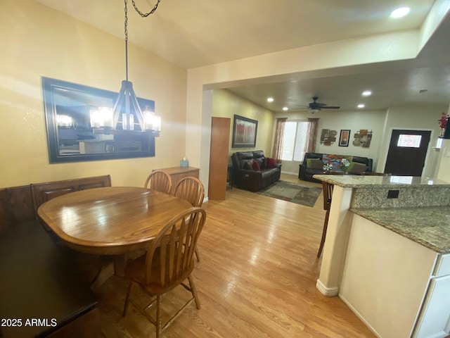 4805 E Kachina Trl Unit 25, Phoenix, AZ 85044 - dining area featuring light wood-style floors, ceiling fan, recessed lighting, and a chandelier