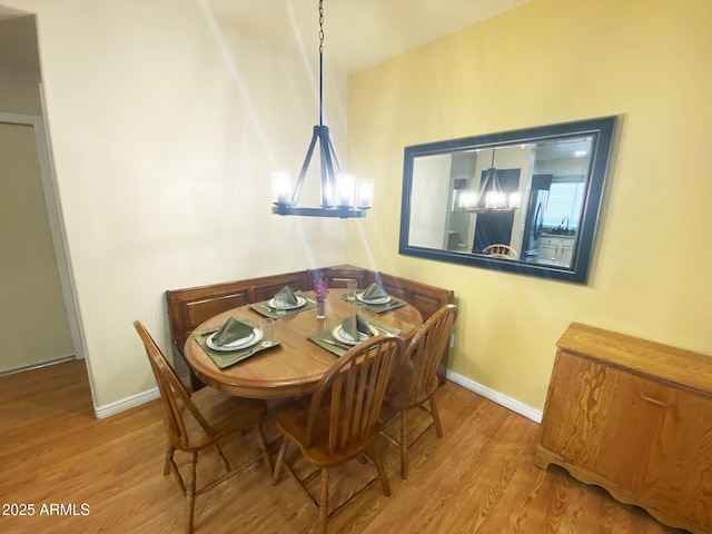4805 E Kachina Trl Unit 25, Phoenix, AZ 85044 - dining area with wood finished floors and baseboards