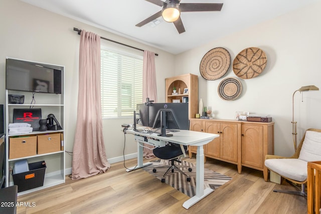 office with ceiling fan, light wood-type flooring, and baseboards