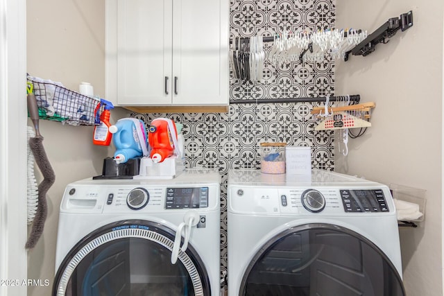 washroom with independent washer and dryer and cabinet space