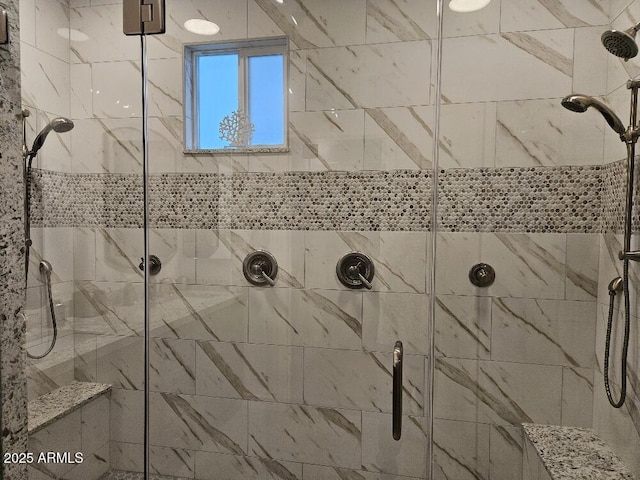 bathroom with an enclosed shower