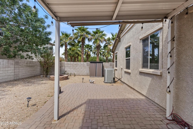 view of patio featuring central AC and a fenced backyard