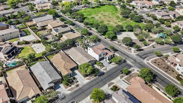 birds eye view of property with a residential view