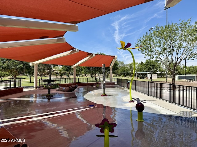 view of property's community with fence