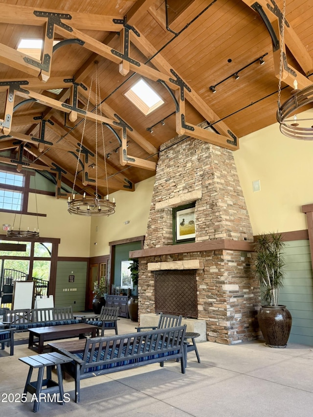 view of patio with an outdoor stone fireplace
