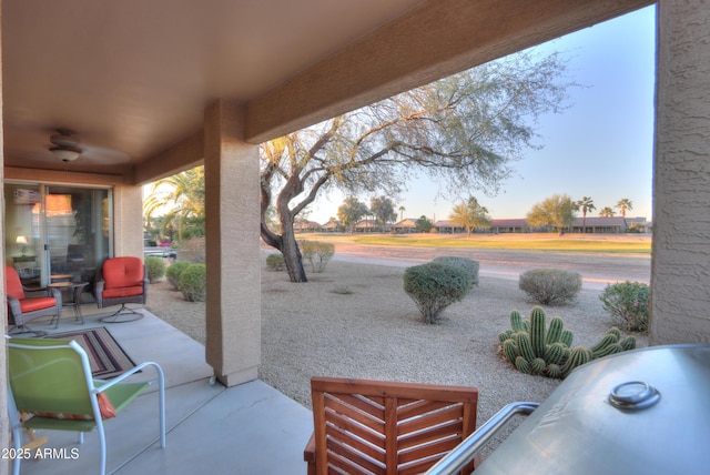 view of patio terrace at dusk