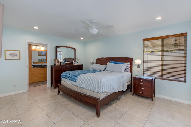 bedroom with light tile patterned floors, multiple windows, and recessed lighting