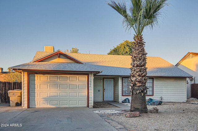 ranch-style house with a garage