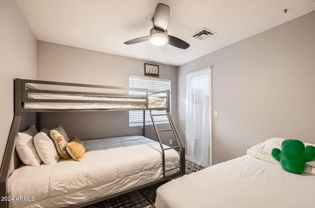 bedroom featuring ceiling fan