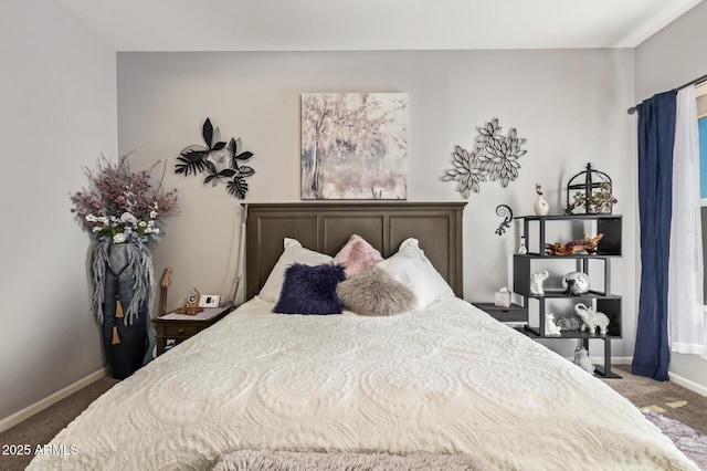 bedroom with baseboards and carpet flooring