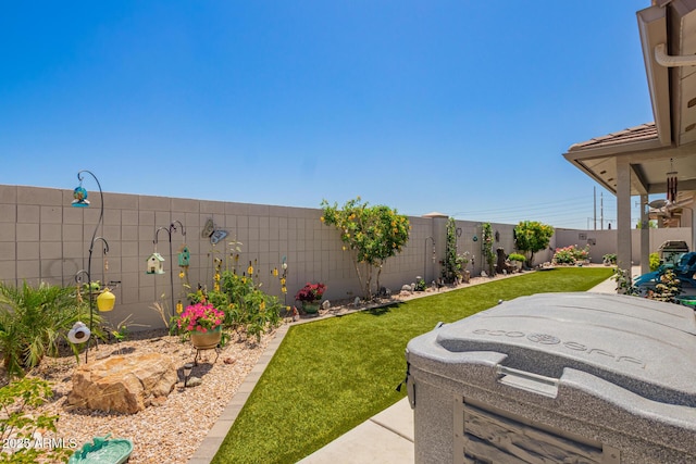 view of yard with a fenced backyard and a patio area