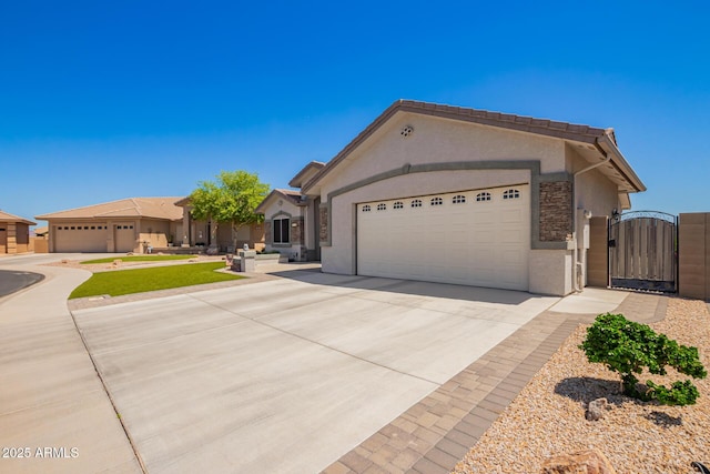 single story home with a garage, a gate, stucco siding, and driveway