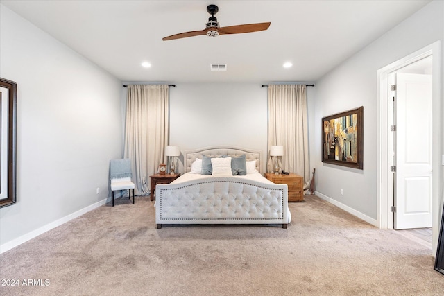 bedroom with light colored carpet and ceiling fan