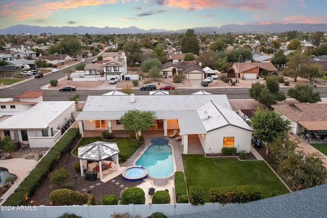 view of aerial view at dusk