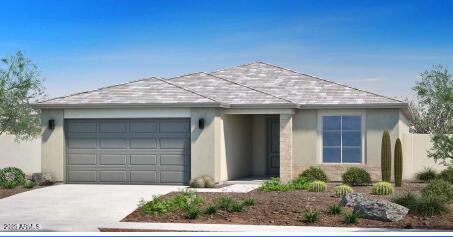 view of front of property with an attached garage, driveway, and stucco siding