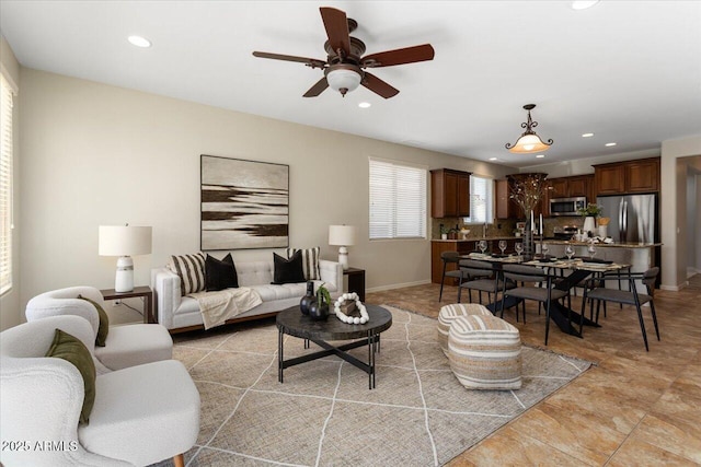 living room featuring ceiling fan