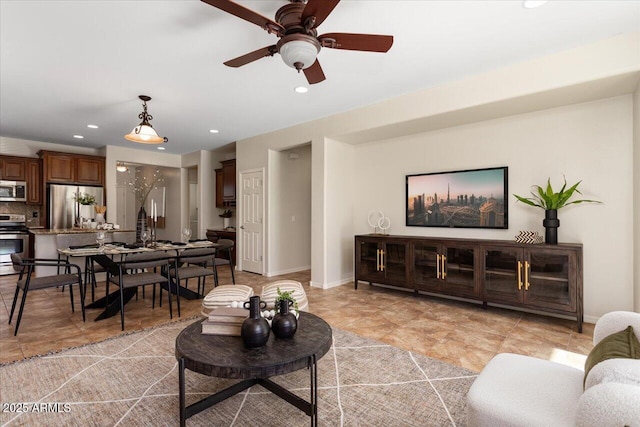 living room with ceiling fan