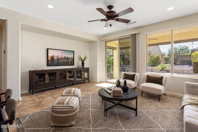 living room featuring ceiling fan