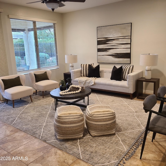 tiled living room featuring ceiling fan