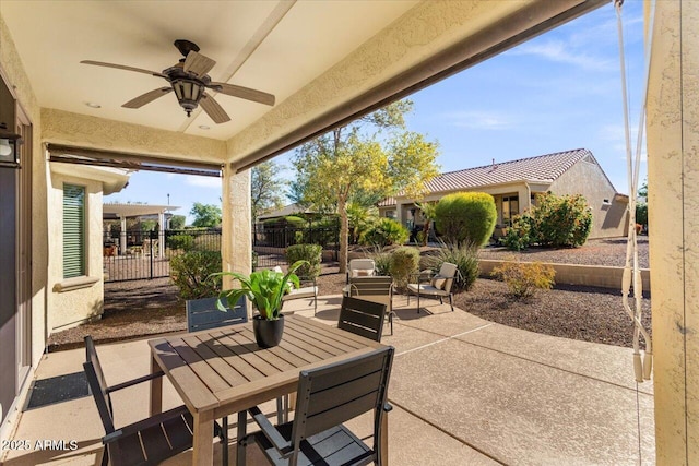 view of patio with ceiling fan