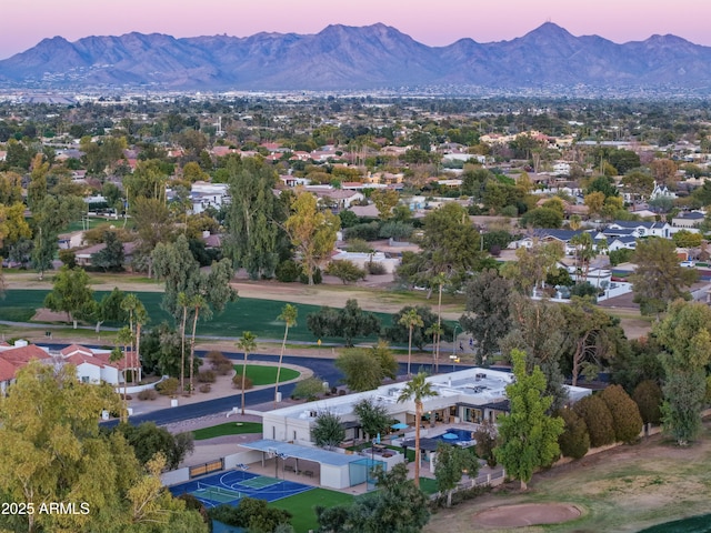 aerial view at dusk with a mountain view