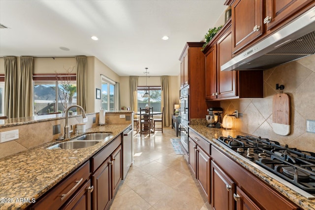 27308 N 56th Dr, Phoenix, AZ 85083 - kitchen featuring under cabinet range hood, a sink, black gas stovetop, stainless steel dishwasher, and tasteful backsplash