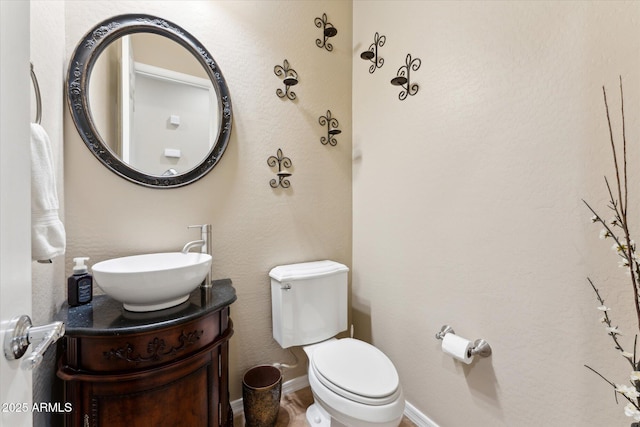 27308 N 56th Dr, Phoenix, AZ 85083 - bathroom with toilet, vanity, and baseboards