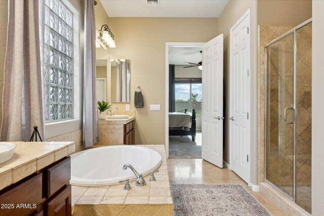 27308 N 56th Dr, Phoenix, AZ 85083 - ensuite bathroom with a shower stall, ceiling fan, a garden tub, and vanity