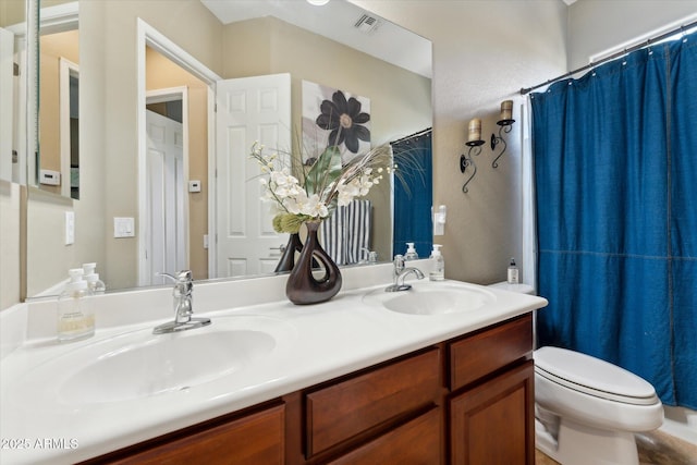 27308 N 56th Dr, Phoenix, AZ 85083 - full bath featuring toilet, double vanity, and a shower with curtain