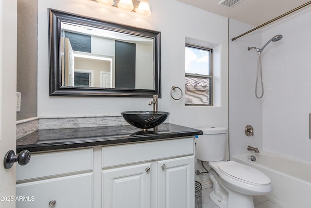 full bath with toilet, visible vents, washtub / shower combination, and vanity