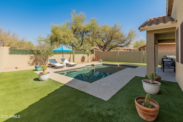 view of swimming pool featuring a patio area, a fenced backyard, a fenced in pool, and a lawn