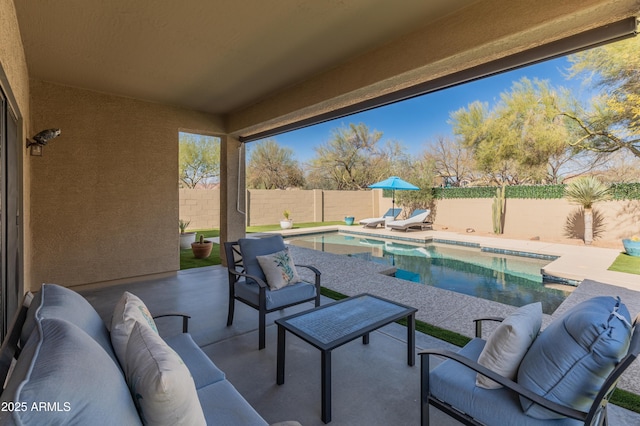 view of patio featuring a fenced backyard, an outdoor hangout area, and a fenced in pool