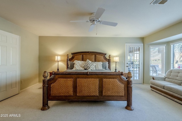 bedroom featuring access to exterior, ceiling fan, and light carpet