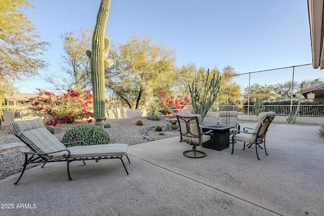 view of patio / terrace with a fire pit