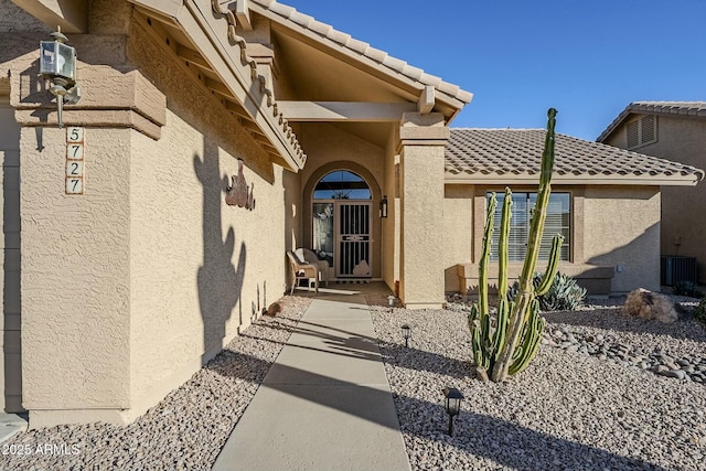 property entrance with central AC unit