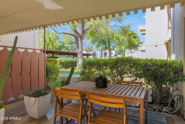 balcony featuring outdoor dining space