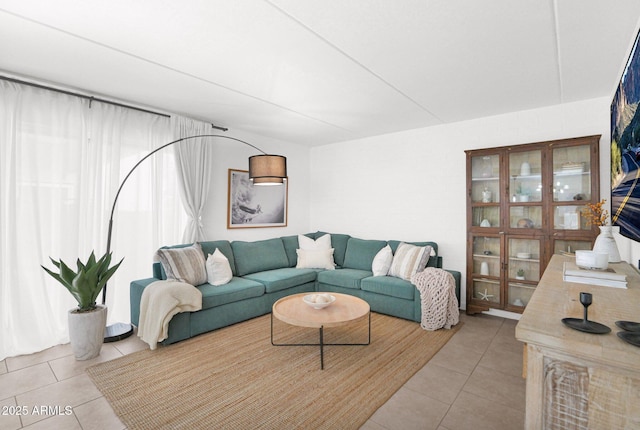 living area featuring light tile patterned floors