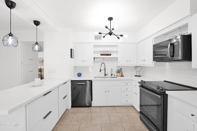 kitchen featuring a sink, dishwasher, a peninsula, black / electric stove, and open shelves