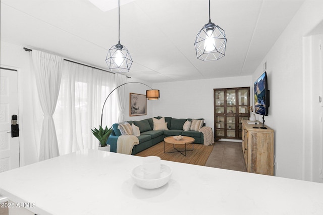 living area featuring tile patterned flooring