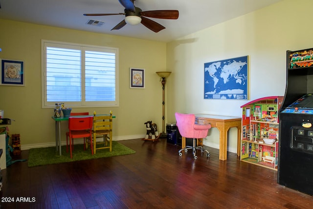 playroom with wood-type flooring and ceiling fan