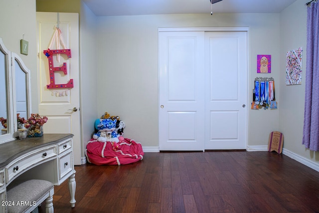 rec room with dark hardwood / wood-style flooring