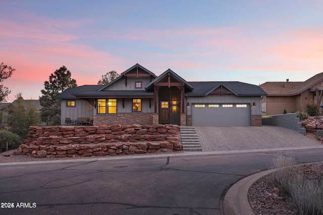 craftsman house with a garage