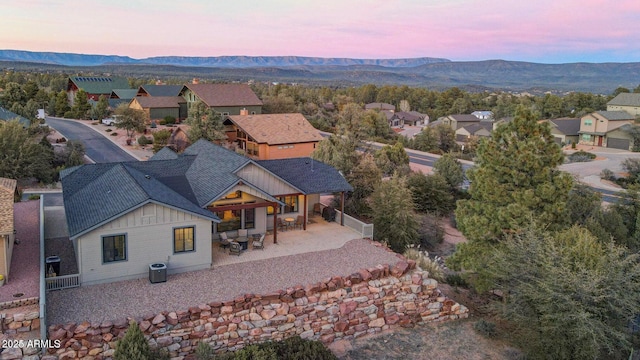 aerial view at dusk with a mountain view