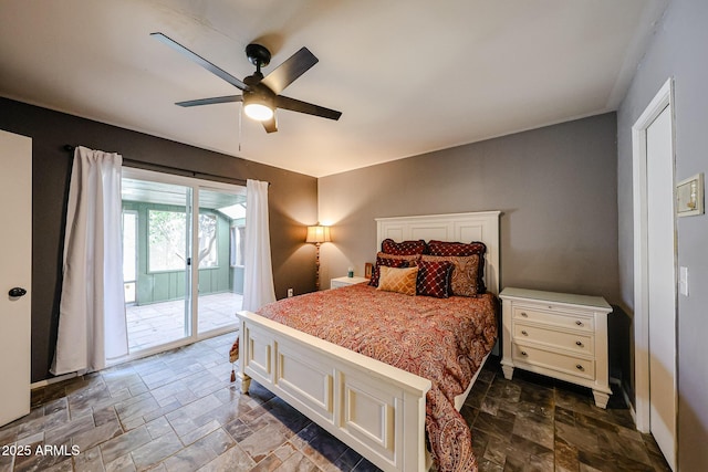 1500 N Markdale Unit 68, Mesa, AZ 85201 - bedroom with access to exterior, stone tile floors, and ceiling fan