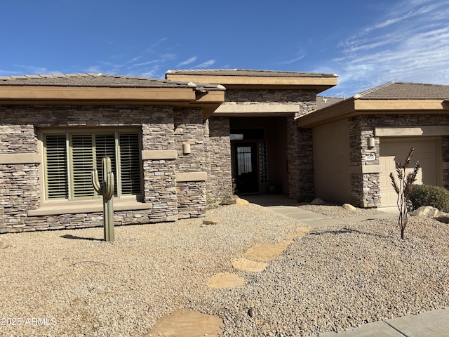 view of front of property featuring a garage