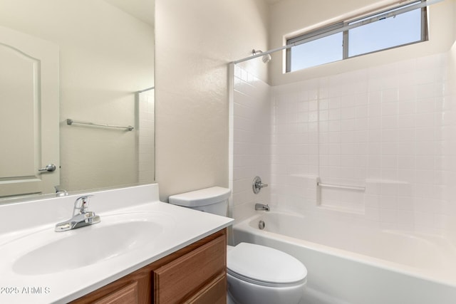 full bathroom with vanity,  shower combination, and toilet