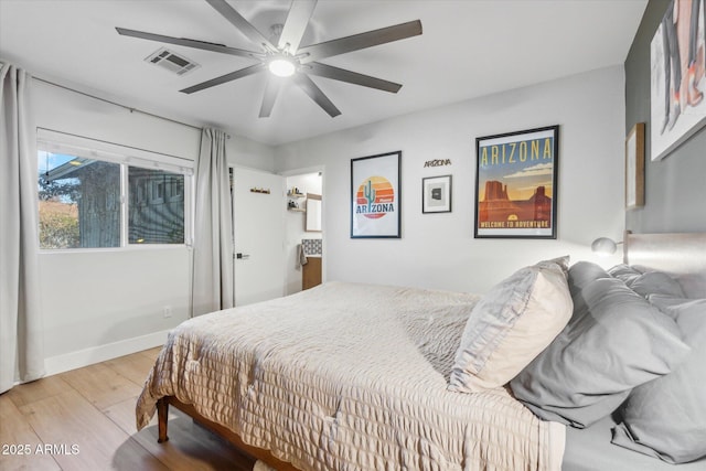 bedroom featuring ceiling fan and light hardwood / wood-style flooring