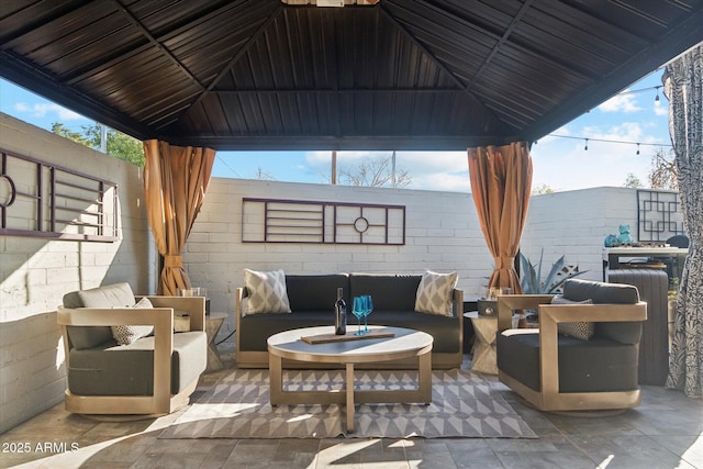 view of patio / terrace featuring a gazebo and an outdoor living space