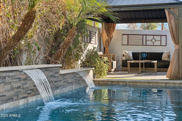 view of pool featuring pool water feature